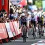 Team Alpecin's Belgian rider Jasper Philipsen reacts while crossing first the finish line of the first stage of the Vuelta a Espana, a 183 km race between Torino - Reggia di Venaria and Novara, in Italy's Piemonte region, on August 23, 2025. (Photo by Marco BERTORELLO / AFP)