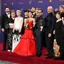 Japanese actor Hiroyuki Sanada (C), alongside cast and crew, winners of Outstanding Drama Series for "Shogun" pose in the press room during the 76th Emmy Awards at the Peacock Theatre at L.A. Live in Los Angeles on September 15, 2024. (Photo by Robyn Beck / AFP)