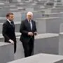 TOPSHOT - German President Frank-Walter Steinmeier (R) and French President Emmanuel Macron visit the Holocaust memorial (Memorial to the Murdered Jews of Europe) in Berlin, on May 27, 2024. (Photo by Ludovic MARIN / AFP)