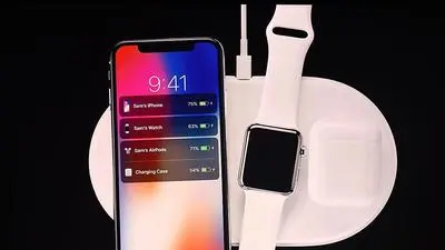 Senior Vice President of Worldwide Marketing at Apple Philip Schiller introduces AirPower, a wireless charging system, during a media event at Apple's new headquarters in Cupertino, California on September 12, 2017.  / AFP PHOTO / Josh Edelson