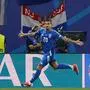Italy's forward #20 Mattia Zaccagni celebrates scoring a goal during the UEFA Euro 2024 Group B football match between Croatia and Italy at the Leipzig Stadium in Leipzig on June 24, 2024. (Photo by Odd ANDERSEN / AFP)
