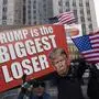 March 25, 2024, New York, New York, USA: Protesters with the activist group Rise & Resist hold signs and banners outside the Manhattan Criminal Courthouse waiting for Former President Donald Trump s arrival at a hearing in the hush money Stormy Daniels case. Protesters hold American flags and a sign with an image of Trump frowning that reads Trump is the biggest loser. New York USA - ZUMAr174 20240325_znp_r174_009 Copyright: xGinaxMxRandazzox