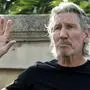 Roger Waters, co-founder of the British rock band Pink Floyd gestures during a photo call before his The Wall Live show in Bucharest, Romania, Wednesday, Aug. 28, 2013. Asked what he thought about a possible military intervention in Syria, Waters told the Associated Press that "it's a very bad idea to get involved in armed conflicts" and "there is no such thing as a surgical strike" .(AP Photo/Vadim Ghirda)