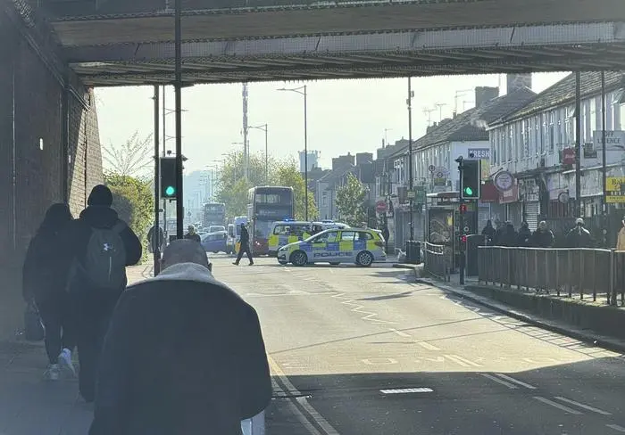 The area in London where police say a man wielding a sword attacked members of the public and two police officers on Tuesday, April 30, 2024 in the east London community of Hainault before being arrested.  The incident is not being treated as terror-related. (Peter Kingdom via AP) MANDATORY CREDIT