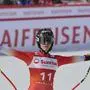 Switzerland's Lara Gut Behrami reacts after completing an alpine ski, women's World Cup downhill race, in Crans Montana, Switzerland, Friday, Feb. 16, 2024. (AP Photo/Marco Trovati)