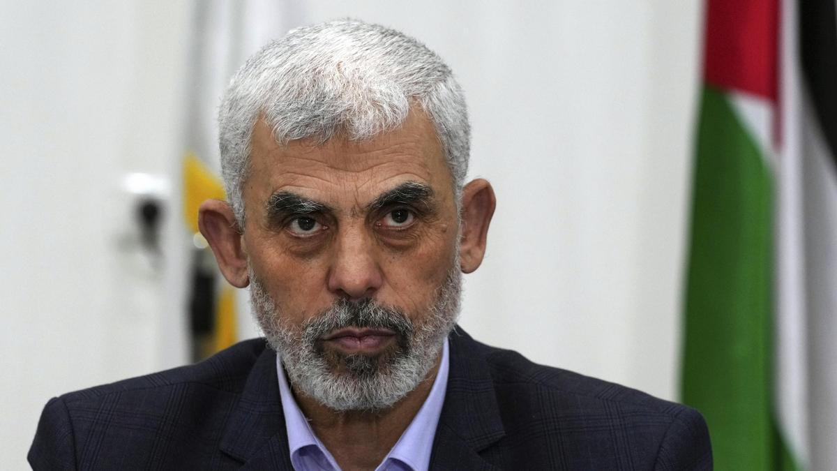 FILE - Yahya Sinwar chairs a meeting with leaders of Palestinian factions at his office in Gaza City, April 13, 2022. (AP Photo/Adel Hana, File)