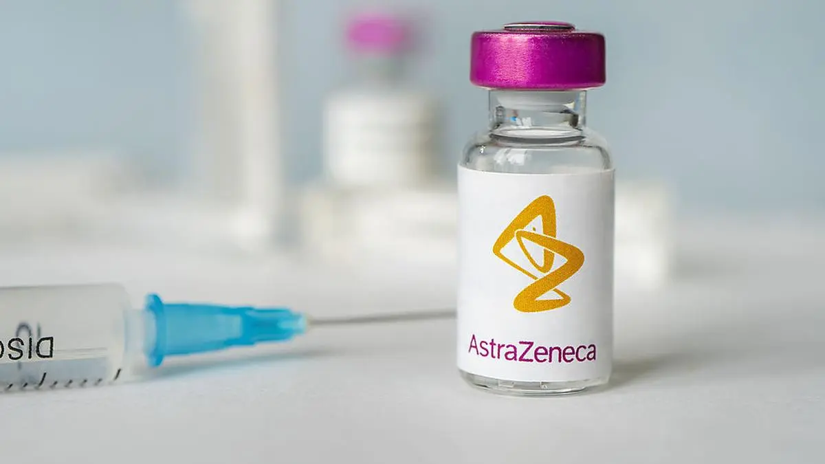 logo of the astrazeneca company on a glass bottle with liquid for injections. february 27, 2021, Barnaul, Russia.