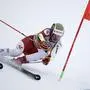 Austria's Manuel Feller speeds down the course during an alpine ski, men's World Cup giant slalom, in Alta Badia, Italy, Sunday, Dec. 22, 2024. (AP Photo/Gabriele Facciotti)