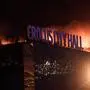 Russland, Schüsse und Brand in Konzerthalle in Moskau March 22, 2024. Russia, Moscow Region, Krasnogorsk. Smoke rises over the Crocus City Hall in the town of Krasnogorsk where unidentified persons opened fire. Evacuation is underway. DmitryxGolubovich