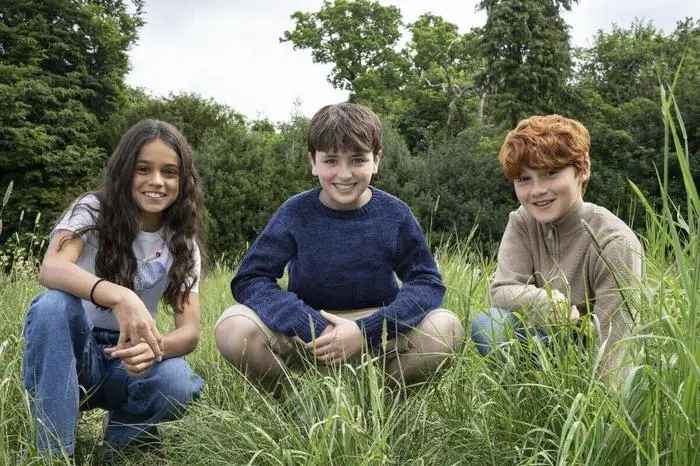 This image released by HBO shows actors, from left, Arabella Stanton, Dominic McLaughlin, and Alastair Stout, who will portray Hermione Granger, Harry Potter and Ron Weasley in the HBO series 