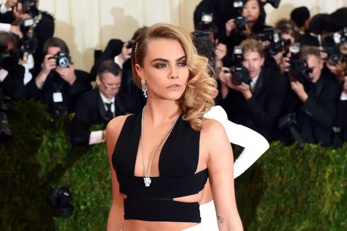 (FILES) Cara Delevigne arrives at the Costume Institute Benefit at The Metropolitan Museum of Art May 5, 2014 in New York. Delevingne's Los Angeles home was gutted in a huge fire on March 15, 2024, in a blaze that left the multimillion-dollar house a smoldering ruin. (Photo by Timothy A. CLARY / AFP)
