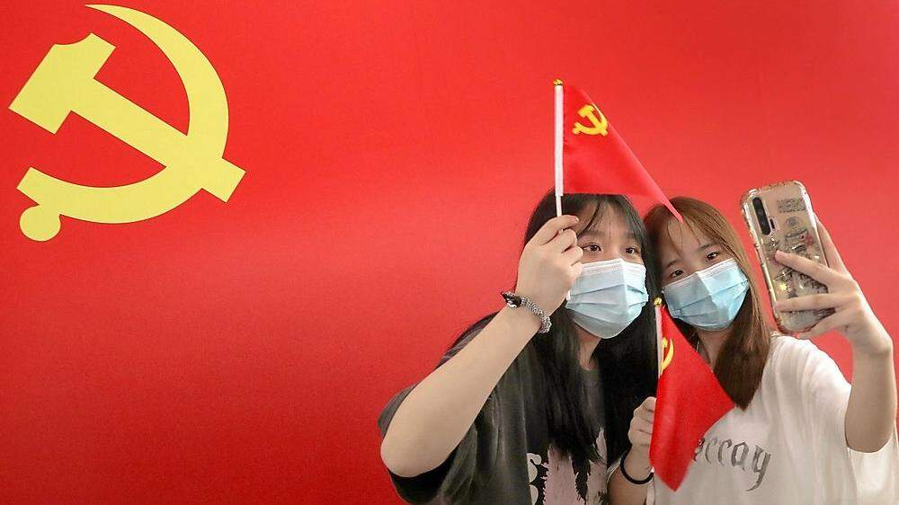 In Peking wird bei Massenveranstaltungen die Liebe zur KP zelebriert.