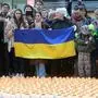 20230221 Lichtermeer fuer die Kinder in der Ukraine WIEN, OESTERREICH - 21. FEBRUAR: Lichtermeer fuer die Kinder in der Ukraine. Anl. des Jahrestages des russischen Angriffs auf die Ukraine erinnern Caritas und ukrainische Gemeinde mit 5.000 Kerzen am Stephansplatz an Not von Mio. Kindern in der Ukrainei. Am Stephansplatz am 21. Februar 2023 in Wien, Oesterreich. 230221_SEPA_32_016 Copyright: xMartinxJuenx SEPAxMedia