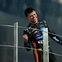 McLaren driver Lando Norris of Britain celebrates after becoming a world champion after the Formula One Abu Dhabi Grand Prix at the Yas Marina Circuit in Abu Dhabi, UAE, Sunday, Dec. 7, 2025. (AP Photo/Fatima Shbair)