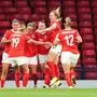 Austria's Julia Hickelsberger (18), third from left, celebrates with teammates after scoring their side's first goal of the game against Scotland during a UEFA Women's Nations League soccer match at Hampden Park, Friday May 30, 2025, in Glasgow, Scotland. (Andrew Milligan/PA via AP)
