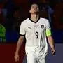Austria's midfielder #09 Marcel Sabitzer celebrates scoring his team's third goal during the UEFA Euro 2024 Group D football match between the Netherlands and Austria at the Olympiastadion in Berlin on June 25, 2024. (Photo by JOHN MACDOUGALL / AFP)