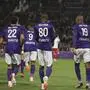 Toulouse players with jerseys marking Women's International Day arrive to play the French League One soccer match between Toulouse and Monaco Friday, March 7, 2025 at the Toulouse stadium, southwestern France. (AP Photo/Fred Scheiber)