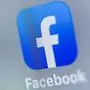 (FILES) This file photo taken on August 28, 2019 shows the logo of US online social media and social networking service, Facebook displayed on a tablet in Lille. - Facebook and Twitter on December 20, 2019 said they had blocked multiple government-backed manipulation operations around the world, several of which favored US President Donald Trump, as part of a crackdown on state-sponsored propaganda efforts. (Photo by DENIS CHARLET / AFP)