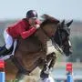 Austria's Gerfried Puck, riding Naxcel V, during the Equestrian Jumping qualifiers, at the 2024 Summer Olympics, Monday, Aug. 5, 2024, in Versailles, France. (AP Photo/Mosa'ab Elshamy)