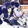Toronto Maple Leafs left wing Pierre Engvall (47) scores his team's third goal of the game against Carolina Hurricanes emergency goalie David Ayres (90) during second-period NHL hockey game action in Toronto, Saturday, Feb. 22, 2020. (Frank Gunn/The Canadian Press via AP)