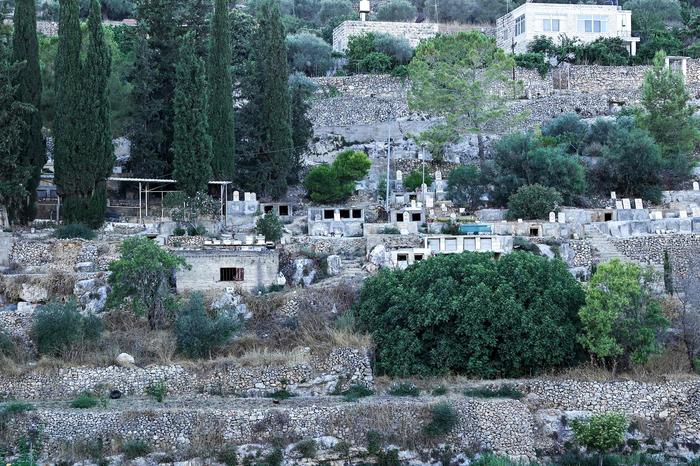 Illegale israelische Siedlung im Westjordanland | Israelische Siedler bauen Häuser in einer UNESCO-Schutzzone südlich von Jerusalem im besetzten Westjordanland. Laut UNO verstoßen die Siedler gegen internationales Recht