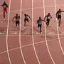(L-R) Turkey's Ramil Guliyev, Trinidad and Tobago's Kyle Greaux, Canada's Andre De Grasse, Britain's Adam Gemili, USA's Noah Lyles, Ecuador's Alex Quinonez, Canada's Aaron Brown and China's Xie Zhenye compete in the Men's 200m final at the 2019 IAAF Athletics World Championships at the Khalifa International stadium in Doha on October 1, 2019. (Photo by Antonin THUILLIER / AFP)