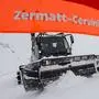 A snow groomer removes snow from the slope during the men's downhill training race on the new ski course "Gran Becca" at the Alpine Skiing FIS Ski World Cup, between Zermatt in Switzerland and Cervinia in Italy, Friday, November 10, 2023. The training was cancelled due to heavy snowfall. (KEYSTONE/Jean-Christophe Bott).
