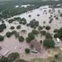 TEXAS, UNITED STATES - JULY 4: (----EDITORIAL USE ONLY - MANDATORY CREDIT - US COAST GUARD HEARTLAND / HANDOUT' - NO MARKETING NO ADVERTISING CAMPAIGNS - DISTRIBUTED AS A SERVICE TO CLIENTS----) An aerial view of the partially submerged in flood waters houses and cars near Kerrville, Texas, United States on July 4, 2025. Coast Guard is conducting rescue operations. US Coast Guard Heartland / Anadolu/ABACAPRESS.COM