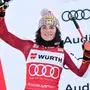 Austria's Julia Scheib celebrates on podium her second place in a alpine ski, women's World Cup giant slalom in Kranjska Gora, Slovenia, Saturday, Jan. 3, 2026. (AP Photo/Marco Trovati)