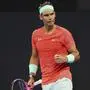 Rafael Nadal of Spain reacts after winning the first set in his match against Dominic Thiem of Austria during the Brisbane International tennis tournament in Brisbane, Australia, Tuesday, Jan. 2, 2024. (AP Photo/Tertius Pickard)