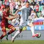 Slovenia's forward #26 Josip Ilicic (R) fights for the ball with Bulgaria's midfielder #20 Filip Krastev (L) during the International friendly football match between Slovenia and Bulgaria at the Stadium Stozice, in Ljubljana, on June 8, 2024. (Photo by Jure Makovec / AFP)