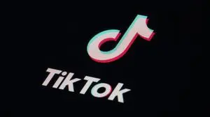 FILE - The icon for the video sharing TikTok app is seen on a smartphone, Tuesday, Feb. 28, 2023, in Marple Township, Pa. TikTok was dismissive Wednesday, March 15, of reports that the Biden administration was calling for its Chinese owners to sell their stakes in the popular video-sharing app, saying such a move wouldn't help protect national security. (AP Photo/Matt Slocum, File)