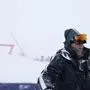 Race official Markus Waldner speaks to the media at the finish area of the course of an alpine ski, men's World Cup downhill race, in Cervinia-Zermatt, Saturday, Nov. 11, 2023. The inaugural World Cup downhill at the storied Matterhorn mountain will have to wait at least one more day after a race Saturday was canceled because of heavy snowfall and strong winds. Race organizers called off plans for the men's downhill soon after 6 a.m. local time at the new Gran Becca course that starts in Switzerland and finishes in Italy. (AP Photo/Marco Trovati)