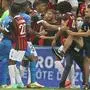 Fans try to invade the pitch during the French L1 football match between OGC Nice and Olympique de Marseille (OM) at the Allianz Riviera stadium in Nice, southern France on August 22, 2021. - The French Ligue 1 game between Nice and Marseille was halted on August 22, 2021, when fans of the home side invaded the pitch and angrily confronted opposing player Dimitri Payet. An AFP journalist at the game said trouble flared in the 75th minute when Marseille star Payet, who had been targeted by plastic bottles every time he took a corner, lobbed one back into the stands. (Photo by Valery HACHE / AFP)