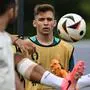 Portugal's forward #26 Francisco Conceicao takes part in the MD-1 training session in Marienfeld, a district of Harsewinkel City in Germany on June 21, 2024, on the eve of their UEFA Euro 2024 Group F football match against Turkey. (Photo by PATRICIA DE MELO MOREIRA / AFP)