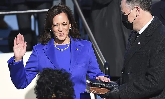 Kamala Harris is sworn in as vice president by Supreme Court Justice Sonia Sotomayor as her husband Doug Emhoff holds the Bible during the 59th Presidential Inauguration at the U.S. Capitol in Washington, Wednesday, Jan. 20, 2021.(Saul Loeb/Pool Photo via AP)