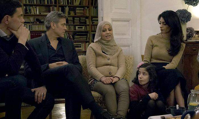Clooneys treffen syrische Flüchtlinge in Berlin 