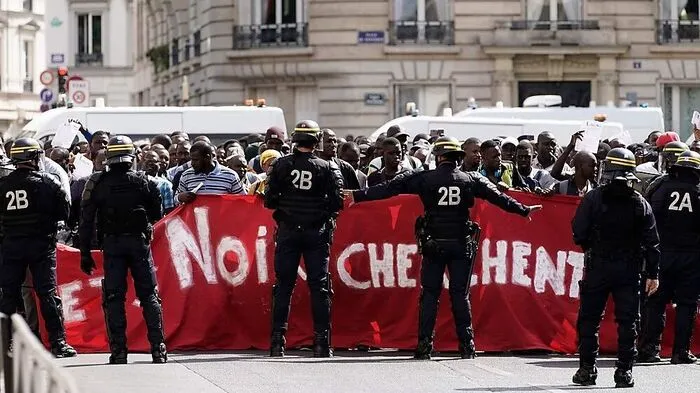 FRANCE-DEMO-MIGRANT
