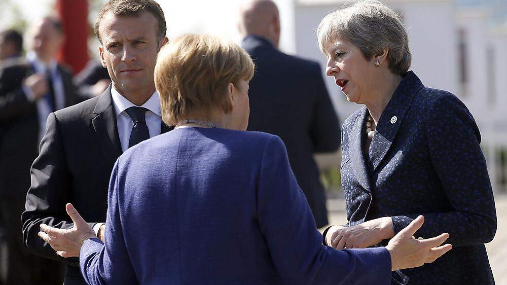 Ratlos in Europa: Emmanuel Macron, Angela Merkel, Theresa May