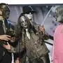 The group Slipknot pose with their award for best metal performance for "Before I Forget" at the 48th Annual Grammy Awards on Wednesday, Feb. 8, 2006, in Los Angeles. (AP Photo/Reed Saxon)