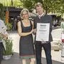 Präsident Franz Titschenbacher und Mostkönigin Hanna gratulierten Familie Lang aus St. Johann/Herberstein