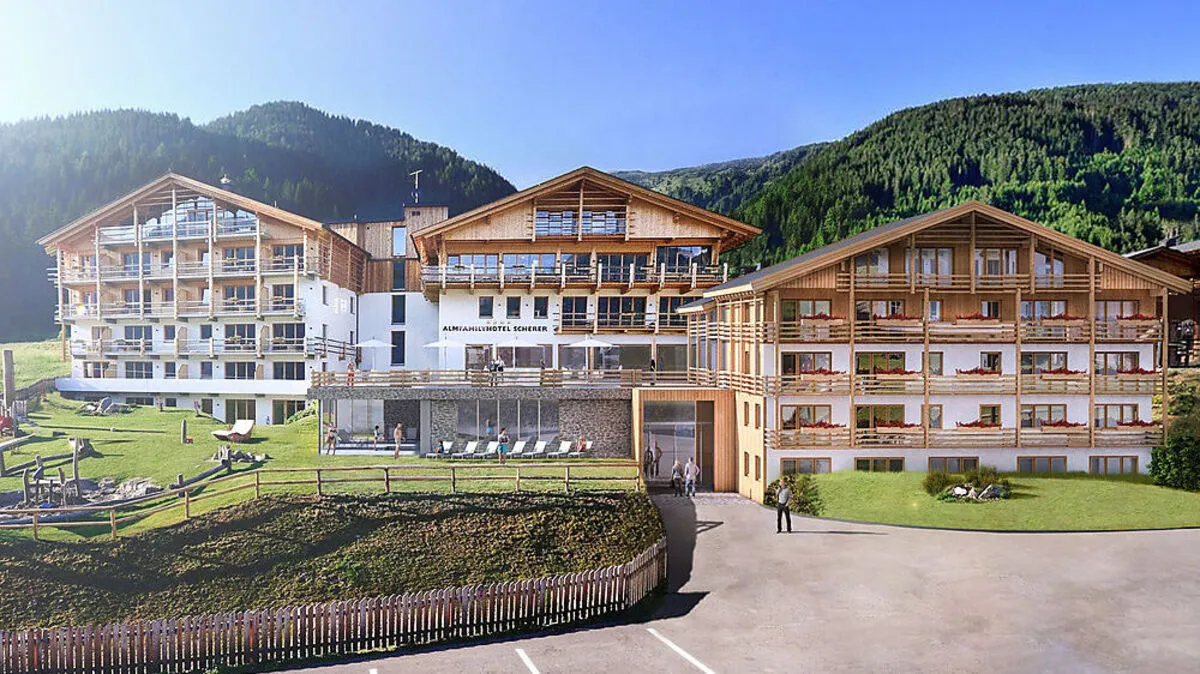 Zum bestehenden Doppelgebäude wird ein neuer Gebäudetrakt gebaut. 