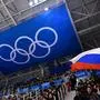 (FILES) In this file photograph taken on February 16, 2018, a spectator waves the Russian flag during the men's preliminary round ice hockey match between the Olympic Athletes from Russia and Slovenia during the Pyeongchang 2018 Winter Olympic Games at the Gangneung Hockey Centre in Gangneung. - In Russia, where criticism of the authorities can lead to dire consequences, the head of the country's anti-doping agency Yury Ganus has openly accused officials of tampering with data handed to the global watchdog. "It's dangerous but it's my mission," the head of RUSADA told AFP, asked if he felt afraid after assigning blame to the sports ministry and Russian law enforcement. The executive of the World Anti-Doping Agency (WADA) is to meet in Lausanne, Switzerland on December 9, 2019, to decide on a proposed four-year international ban of Russian athletes over the handling of doping allegations. (Photo by Brendan Smialowski / AFP)
