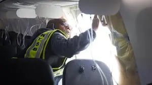 January 8, 2024, Portland, OR, United States: NTSB investigators examine the missing door plug section on Alaska Airlines Flight 1282, a Boeing 737-9 MAX commercial aircraft, January 7, 2024 in Portland, Oregon. The aircraft suffered a blowout of a door plug on January 5th resulting in uncontrolled decompression of the aircraft and forcing an emergency landing. Portland United States - ZUMAp138 20240108_zaa_p138_002 Copyright: xNtsb/NationalxTransportationx