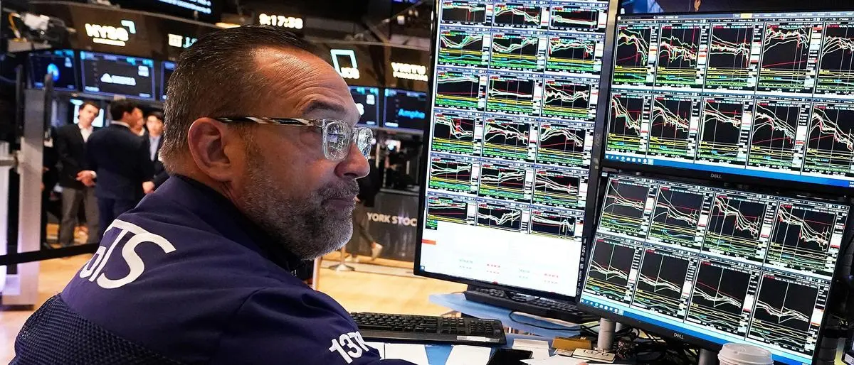 FILE - Specialist Anthony Matesic works on the floor of the New York Stock Exchange, Tuesday, May 6, 2025. (AP Photo/Richard Drew, File)