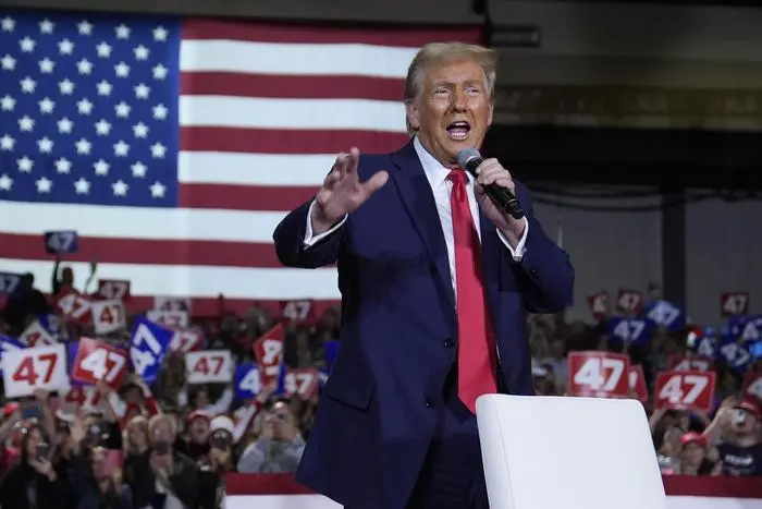 Republican presidential nominee former President Donald Trump speaks at a town hall in Lancaster, Pa., Sunday, Oct. 20, 2024. (AP Photo/Evan Vucci)