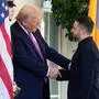 President Donald Trump, left, greets Ukraine's President Volodymyr Zelenskyy at the White House, Friday, Oct. 17, 2025, in Washington. (AP Photo/Alex Brandon)