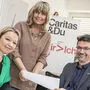 Ernst Sandriesser, neuer Caritas-Direktor, mit Mitarbeiterinnen