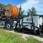 Bei der Glasfaser-Offensive kommt der „UNItrencher“ von BIK und Straßenverwaltung zum Einsatz 
