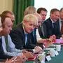 (L-R) Britain's International Trade Secretary Liz Truss, Britain's Health and Social Care Secretary Matt Hancock, Cabinet Secretary Mark Sedwill, Britain's Prime Minister Boris Johnson, Britain's Chancellor of the Exchequer Sajid Javid, Britain's Work and Pensions Secretary Amber Rudd, Britain's Housing, Communities and Local Government Secretary Robert Jenrick, Britain's Scotland Secretary Alister Jack and Britain's Culture Secretary Nicky Morgan listen as Britain's Prime Minister Boris Johnson (C) holds his first Cabinet meeting at 10 Downing Street in London on July 25, 2019. - Britain's newly installed Prime Minister Boris Johnson held his first cabinet meeting today faced with the burning challenge of resolving the three-year Brexit crisis in three months. (Photo by Aaron Chown / POOL / AFP)